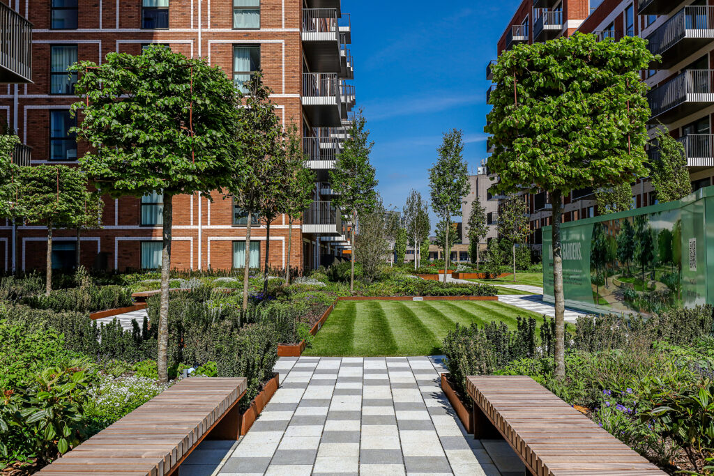 Hard and soft landscaping across the podium gardens at Silkstream, Hendon